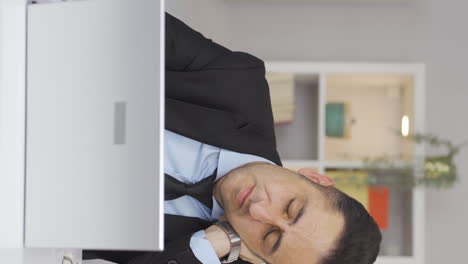 Vertical-video-of-Home-office-worker-man-has-neck-pain.